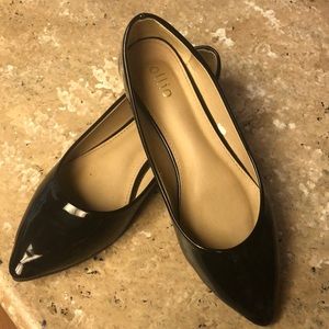 Patten leather flats